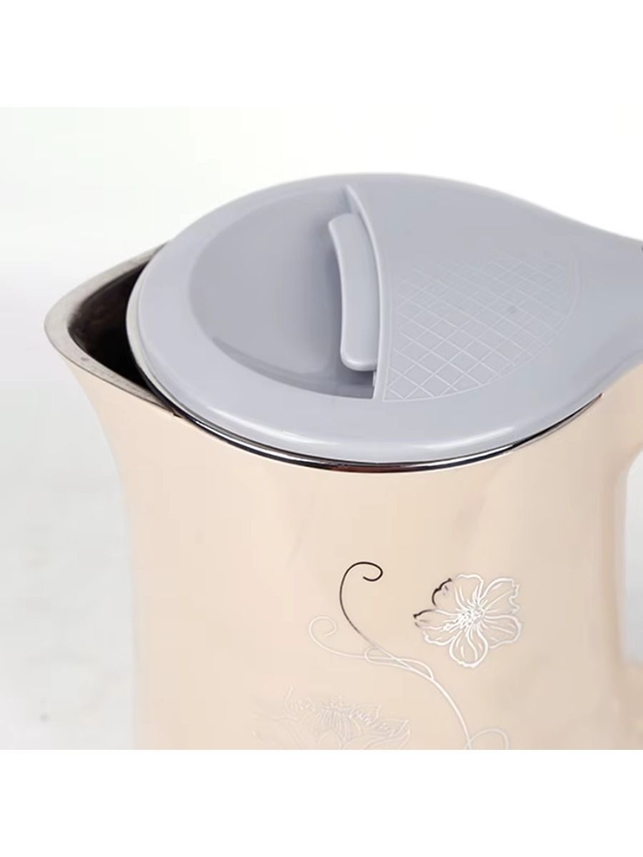 1500W electric kettle with large capacity of 1.8 liters, stainless steel, double-walled, suitable for home and hotel use.