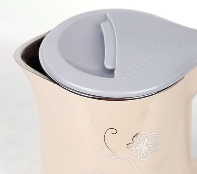 1500W electric kettle with large capacity of 1.8 liters, stainless steel, double-walled, suitable for home and hotel use.