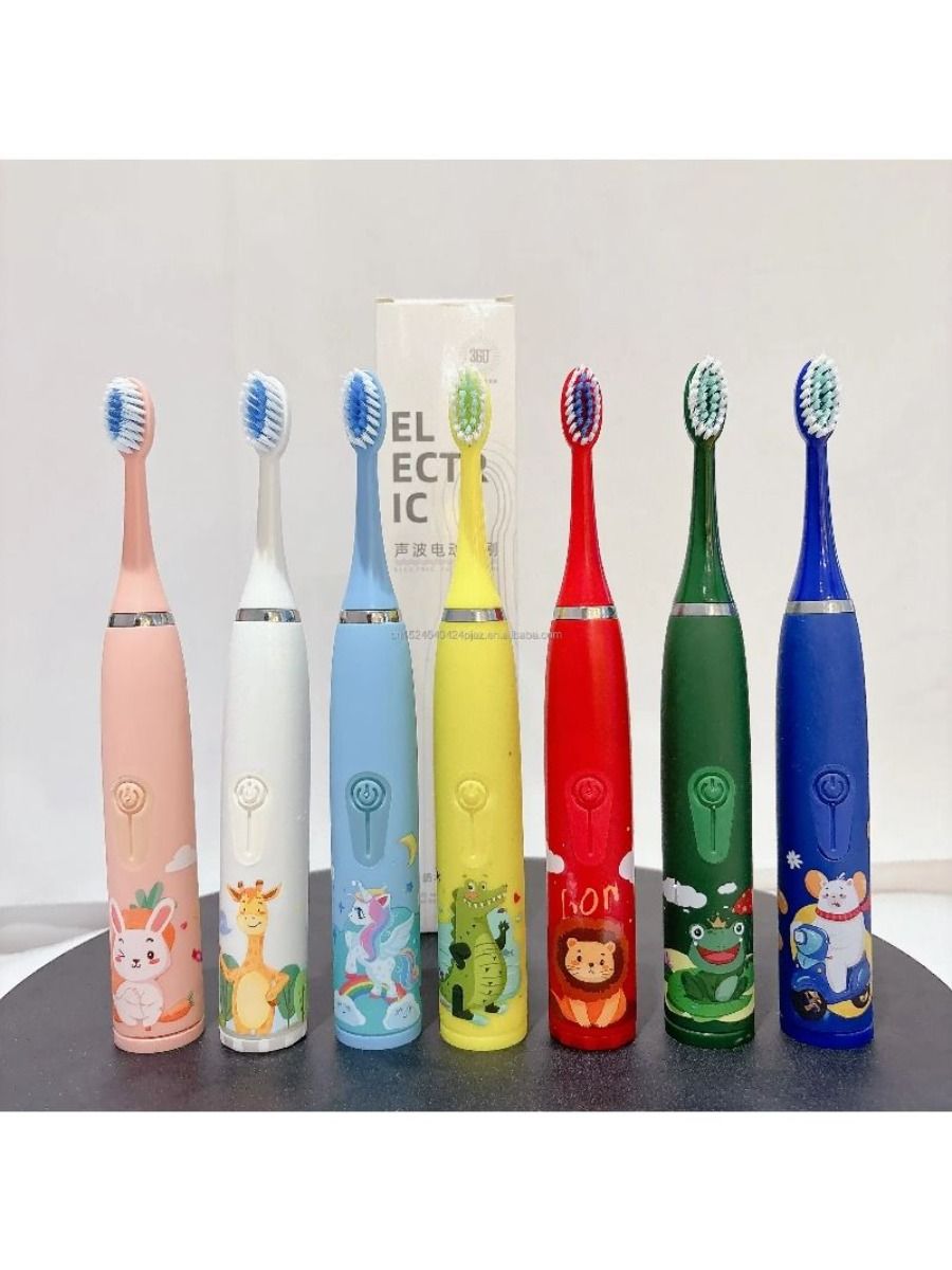 Electric children's toothbrush with soft bristles, featuring a two-minute timer and six replacement heads